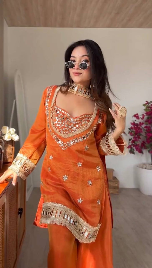 Radiant Rust: Orange Hand-Embellished Mirror Work Kurta Set with Flared Palazzos