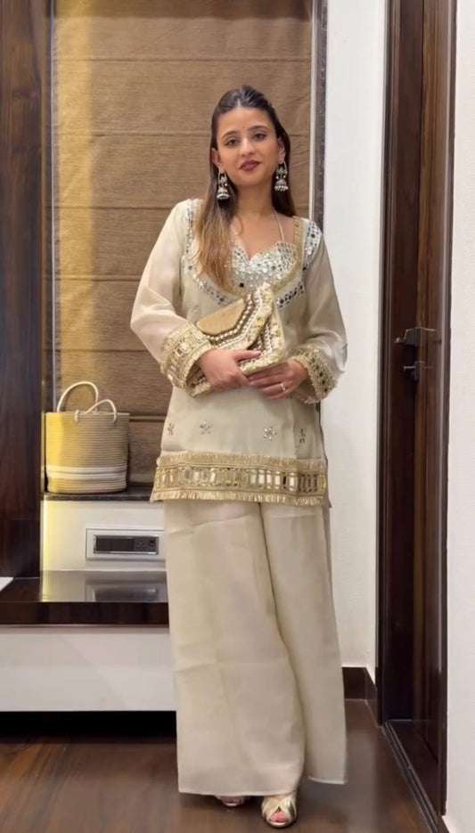 Radiant Rust: White Hand-Embellished Mirror Work Kurta Set with Flared Palazzos
