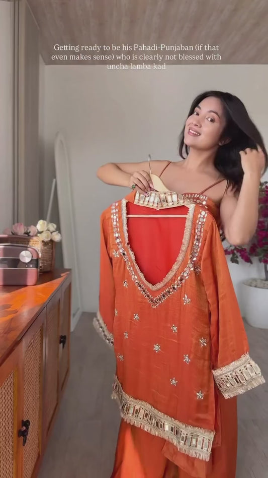 Radiant Rust: Orange Hand-Embellished Mirror Work Kurta Set with Flared Palazzos